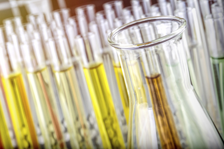 Several Test Tubes And Glass Of Precipitation In A Laboratory