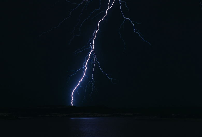 Bolt of lightning in a midnight sky, South Africa