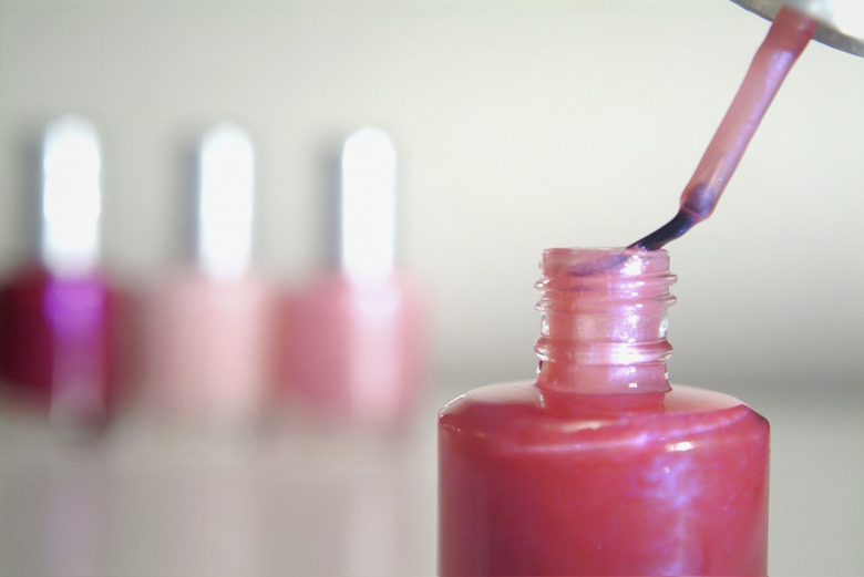 Close-up of a bottle of pink nail polish