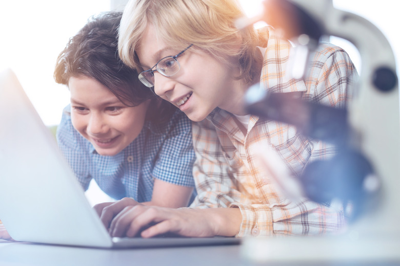 Admirable children working on an investigatory science project