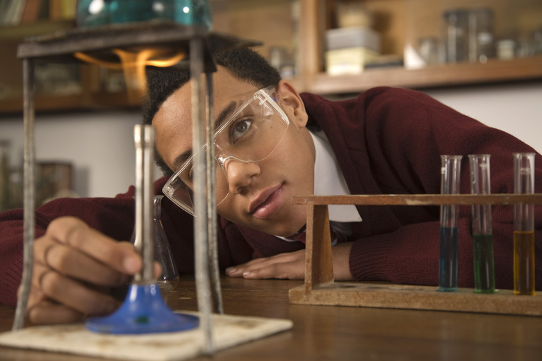 Student using bunsen burner