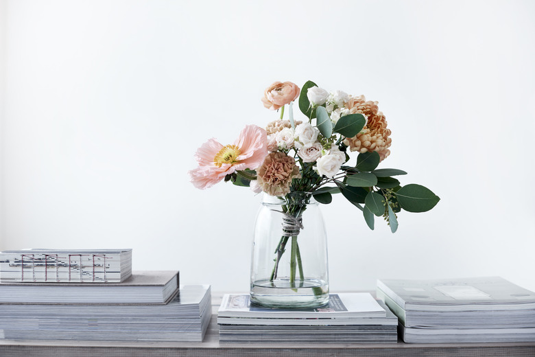 pastel cut flowers in a glass vase