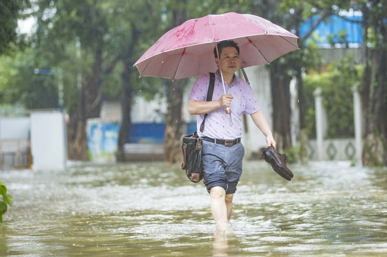 Typhoon Ewiniar Lands In Guangdong