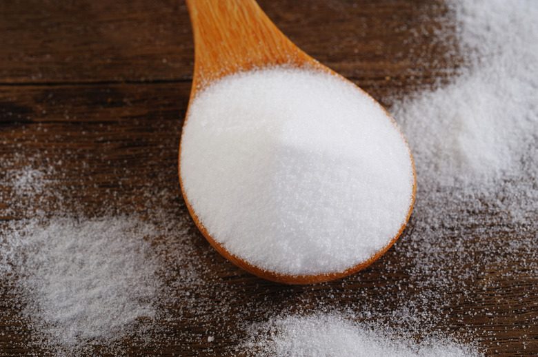 Bicarbonate in a wooden spoon