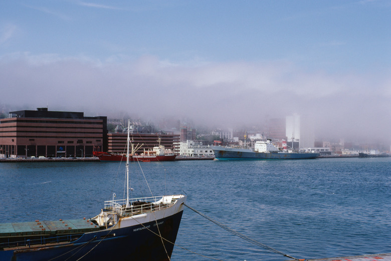 Smog covering city by river