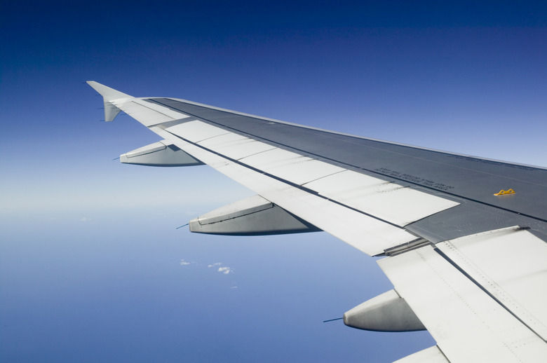 Plane wing seen from plane, aerial view