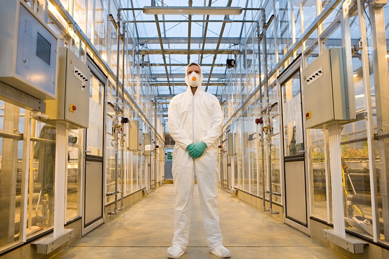 Scientist in protective suit