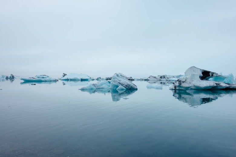 Ice floes in still water.