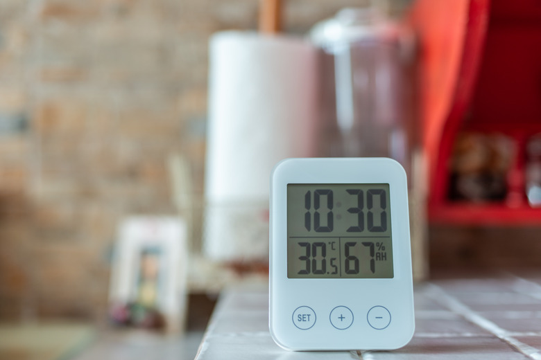 Digital clock with temperature & humidity sensor