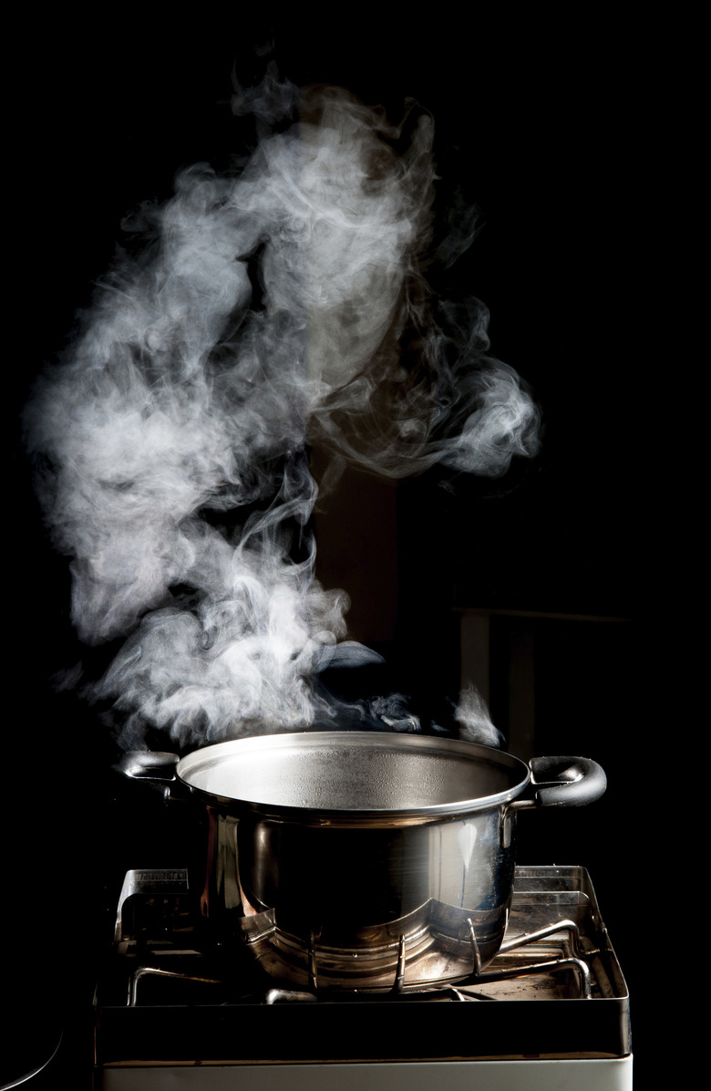 steam over cooking pot