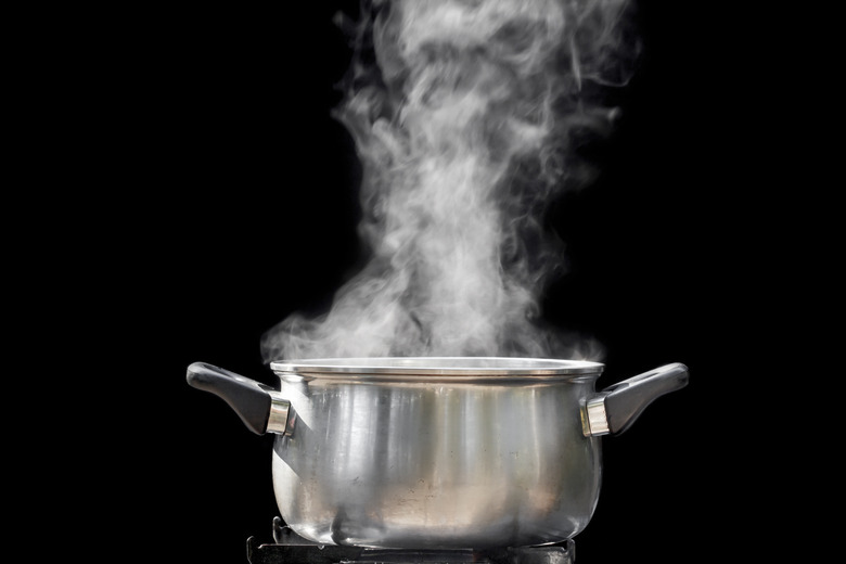 steam over cooking pot