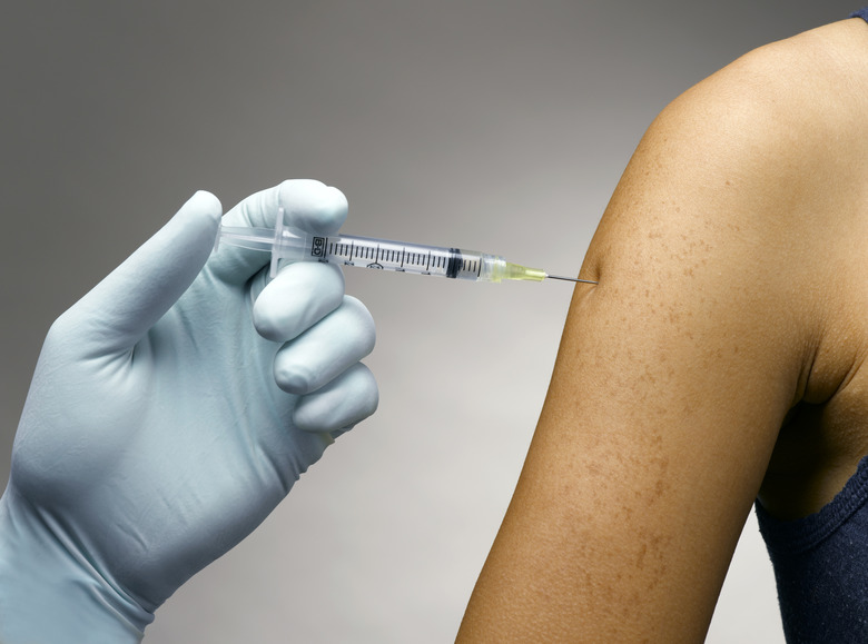 Person receiving a vaccine