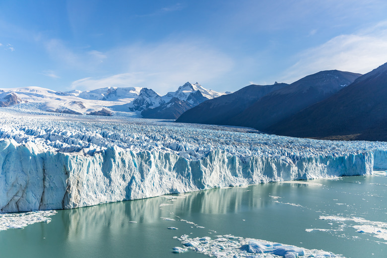 Amazing view of Perito Moreno glacier, blue ice burg glacier from peak of the mountain through the aqua blue lake in Los Glaciares National Park, Santa Cruz, Argentina, southern Patagonia ice field