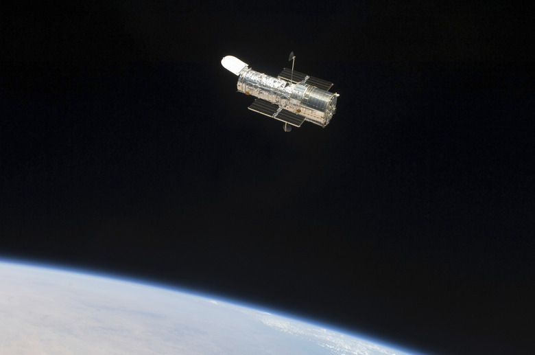 The Hubble Space Telescope in orbit above Earth.