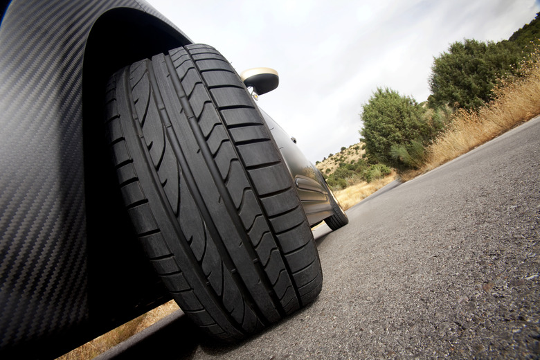 Low shot of a tire on a black car