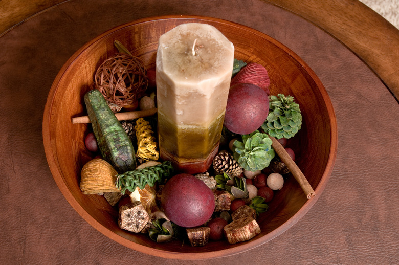 High angle view of decorative candle in bowl