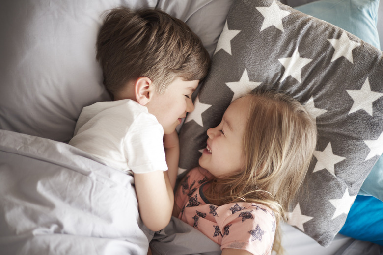 High angle view on sleeping siblings