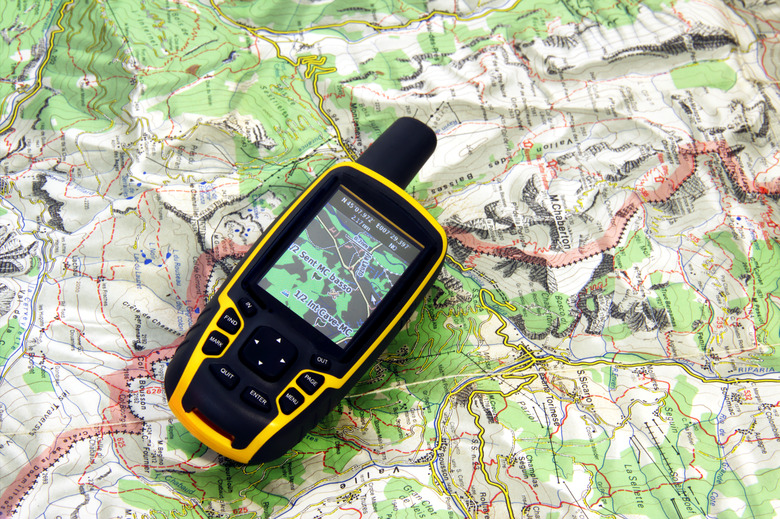 GPS receiver and map - tools used in geography