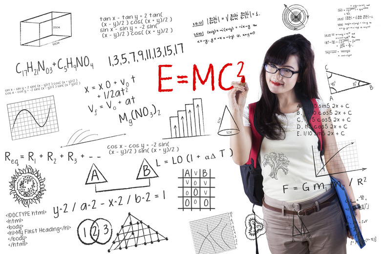 Female student writes formula