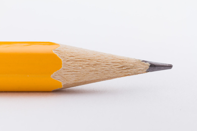 Close-Up Of Yellow Pencil On White Background