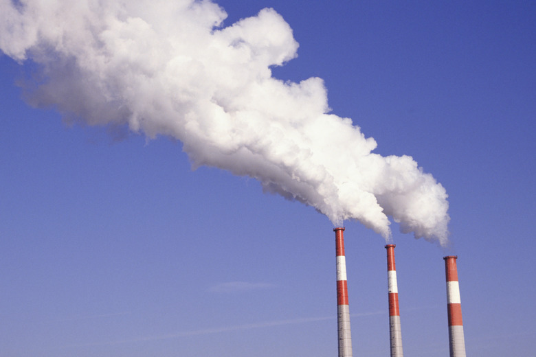 Smoke emitting from chimney stacks