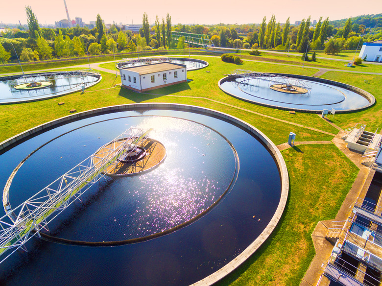 Aerial view to sewage treatment plant. Grey water recycling. Waste management in European Union.