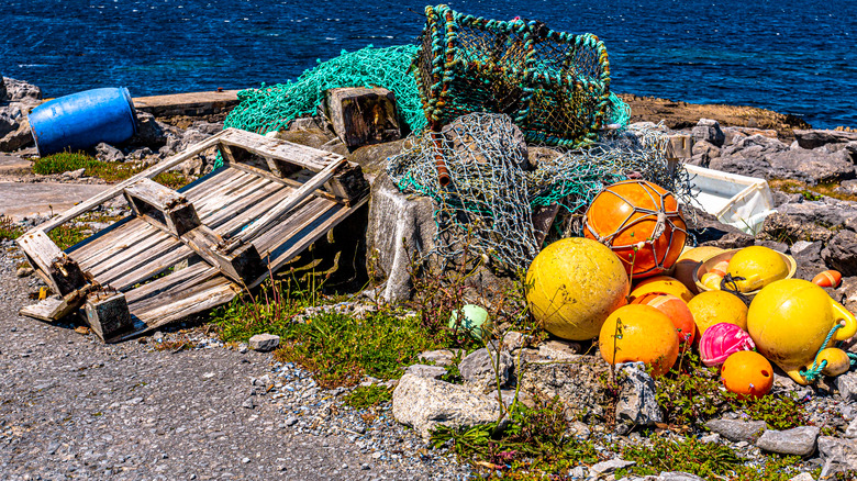 Impressive accumulation of marine litter, such as buoys, pallets, fishing nets