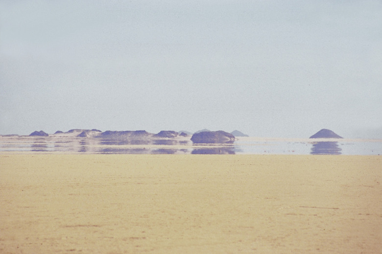 Mirage on dry sand in Sahara Desert