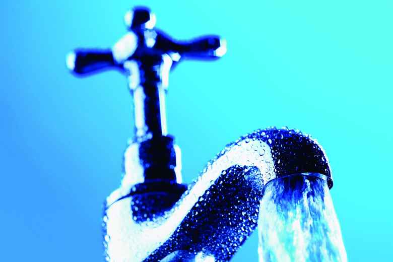 Water Pouring From a Faucet