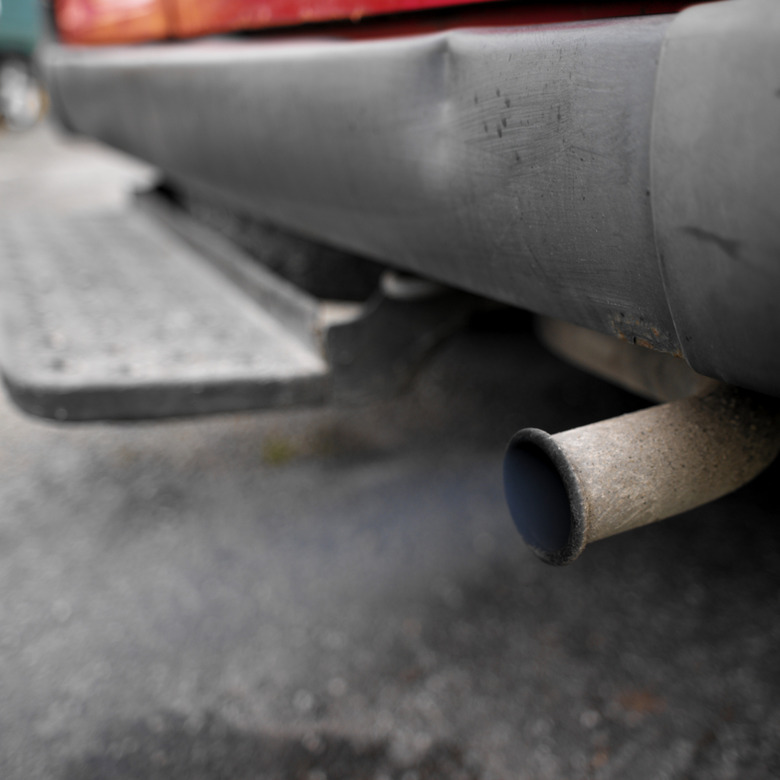 close-up of a car exhaust pumping out of fumes