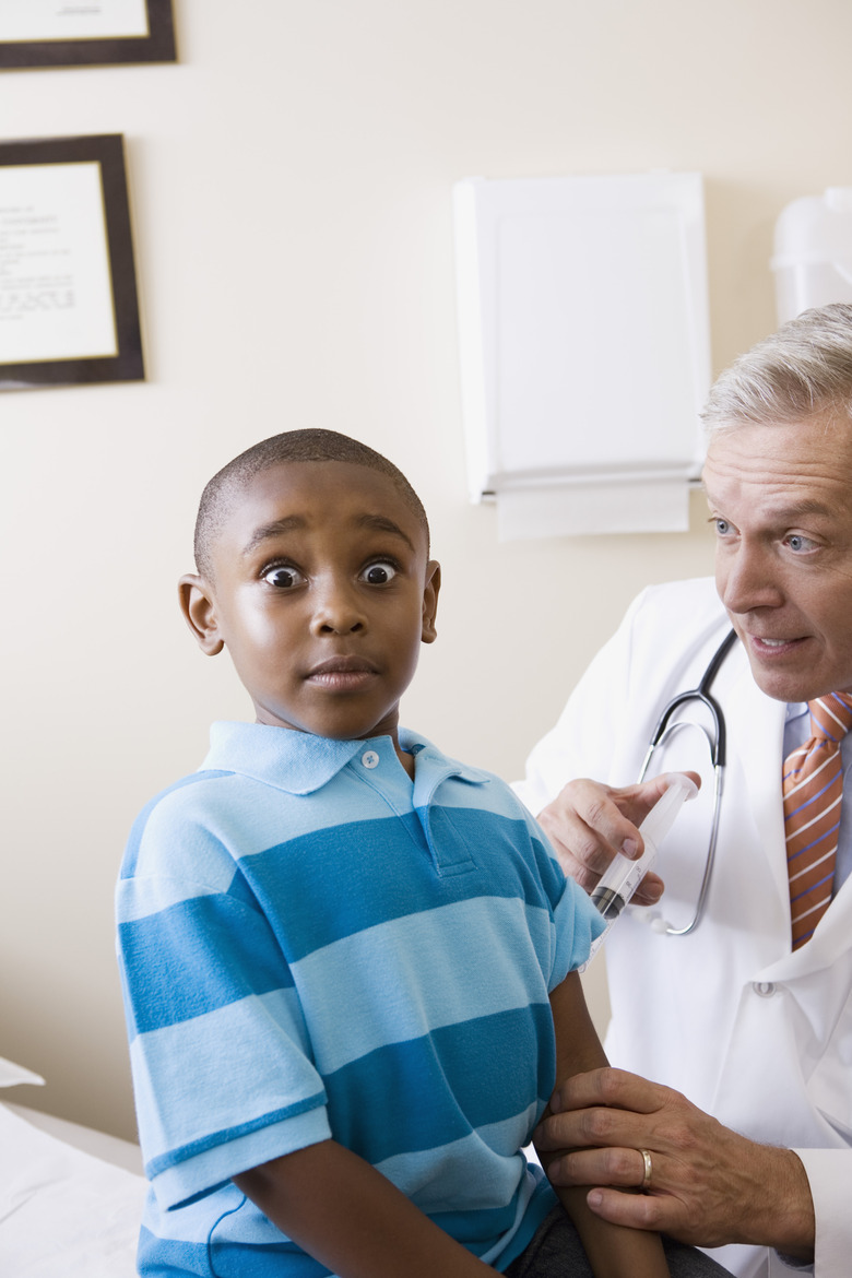 Surprised kid with doctor