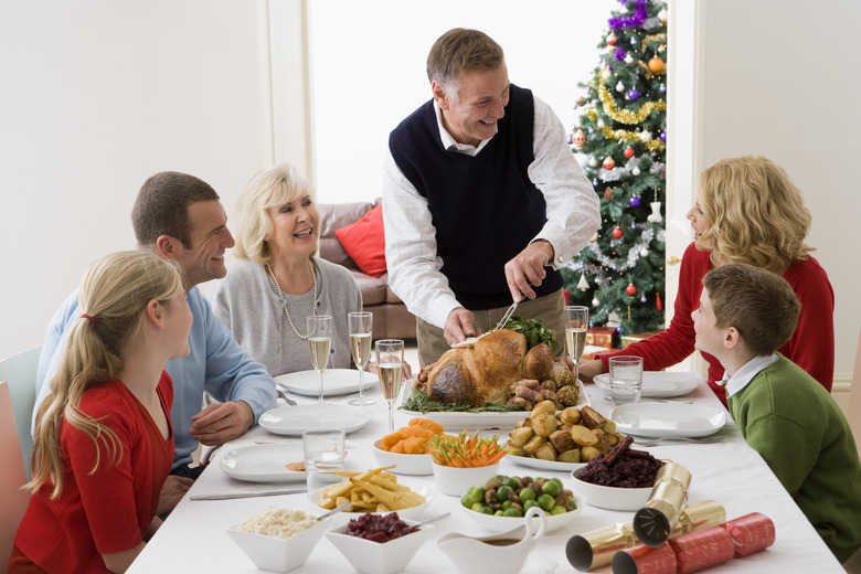 Carving turkey at Christmas dinner