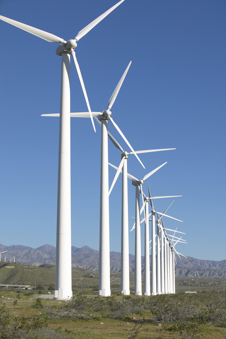 Large Group of Wind Turbines in a Row at a Wind Farm