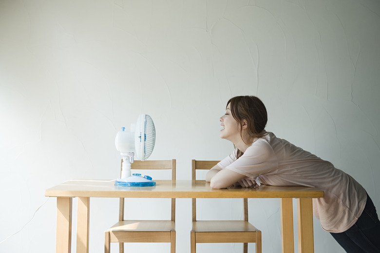 Young woman with fan